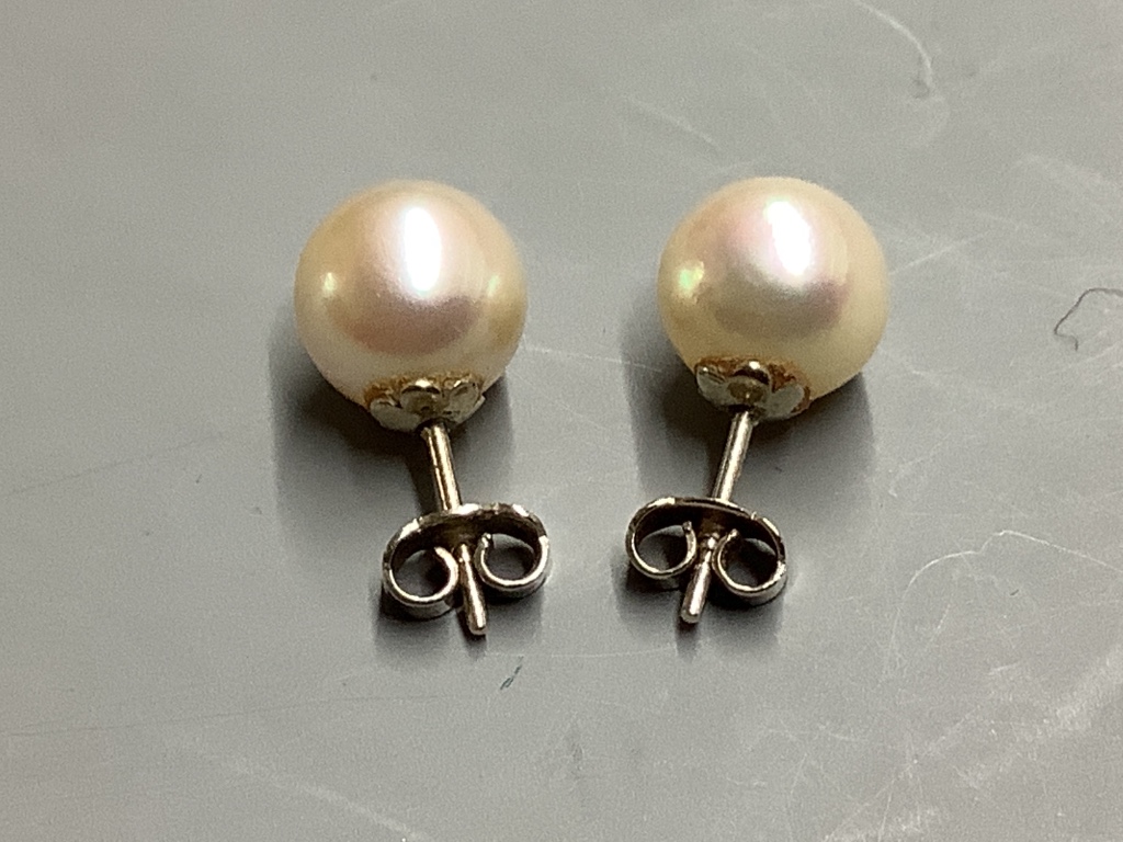 A pair of white metal and cultured pearl stud earrings